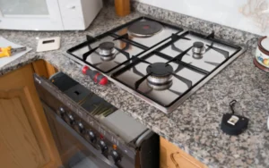 Technician fixing a faulty stove in Cape Town