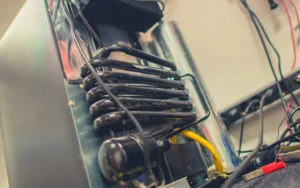Technician fixing a faulty household appliance in Cape Town